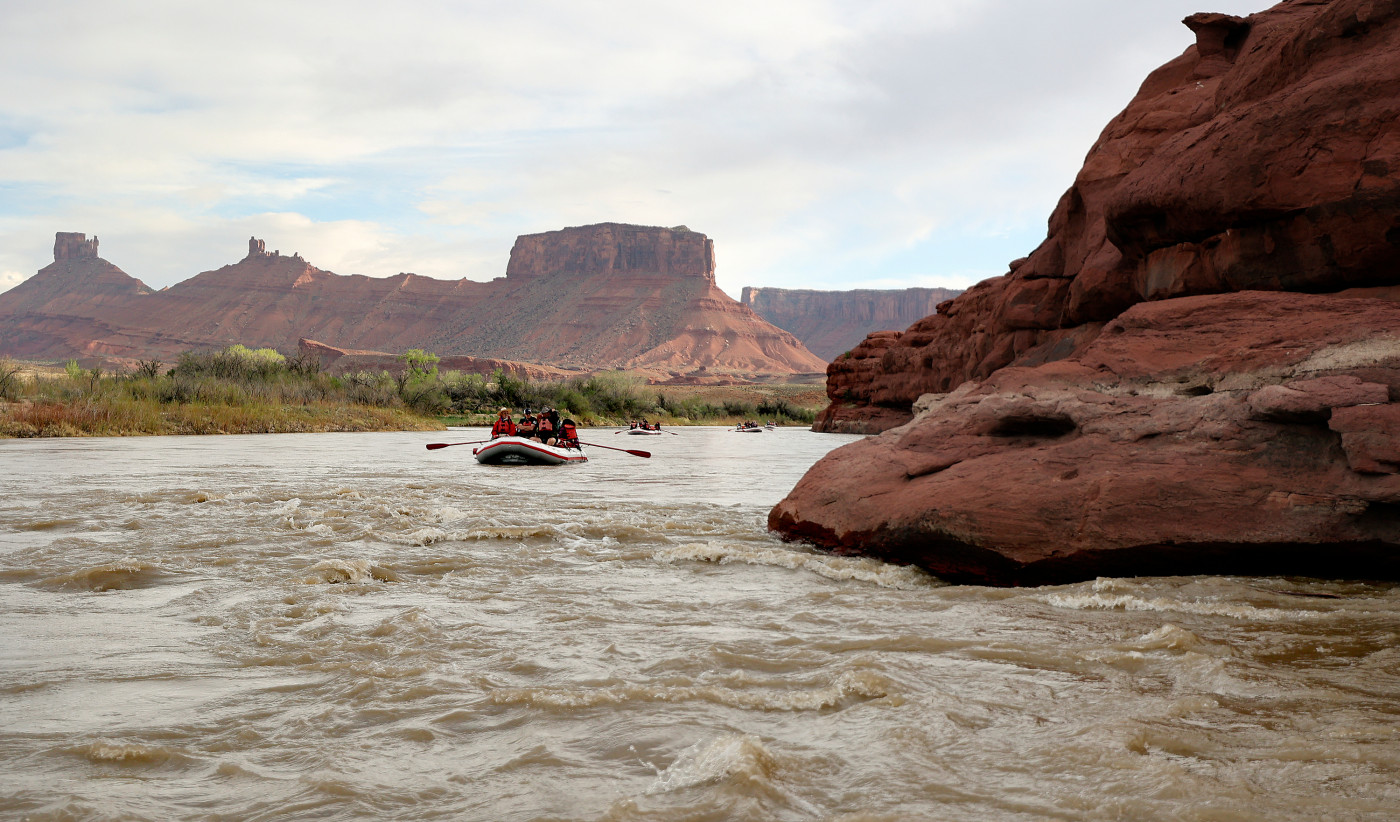 Journalists and water experts raft down the Moab Daily section of the Colorado River with Holiday River Expeditions during a kickoff event for the Colorado River Collaborative in Grand County on Thursday, April 25, 2024.